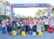 Aksi Kemanusiaan Warnai Bhayangkara Otomotif, Kapolda Sulteng Bagi Ratusan Sembako dan Kursi Roda