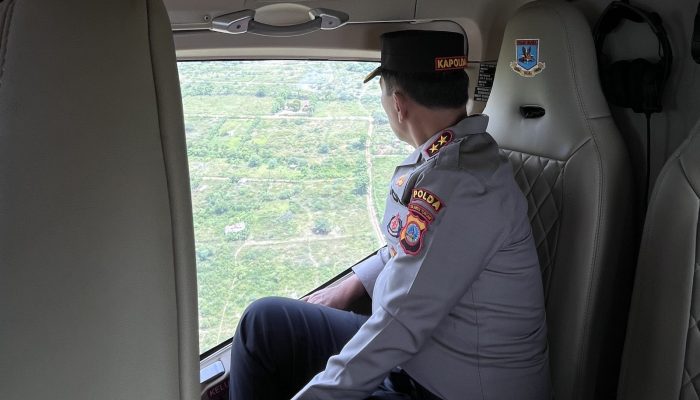 Dari Udara, Kapolda Sulteng Cek Situasi Palu dan Pembangunan Jembatan Polri di Wani