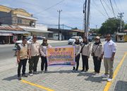 Edukasi Warga, Satpol PP Palu Turun ke Lampu Merah Kampanyekan Kebersihan