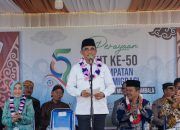 Hadiri HUT Emas Transmigrasi Tinombala, Gubernur Anwar Hafid Paparkan Program Berani